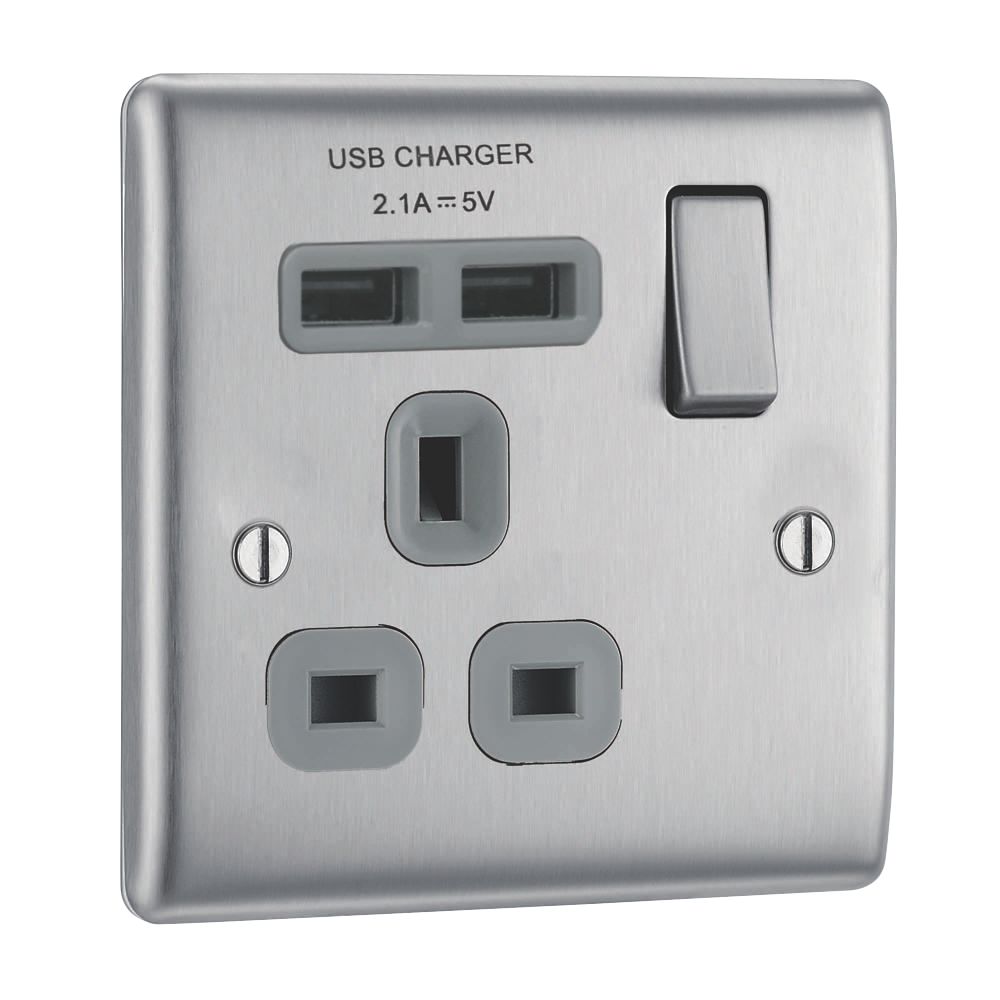Image of British General Nexus Metal 13A 1-Gang SP Switched Socket + 2.1A 2-Outlet Type A USB Charger Brushed Steel with Graphite Inserts 